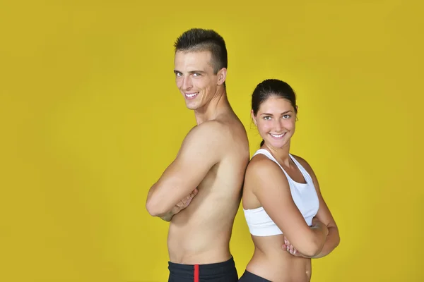 Young fit man and woman — Stock Photo, Image