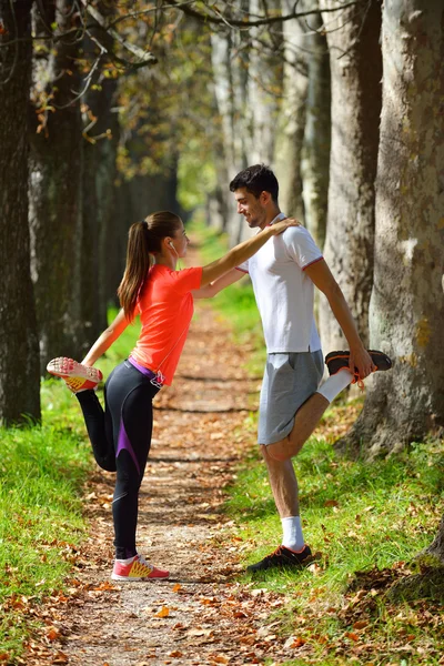 Young couple exercising — Stock Photo, Image