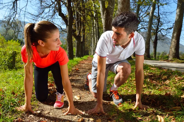 Young couple exercising — Stock Photo, Image