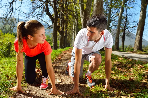 Young couple exercising — Stock Photo, Image