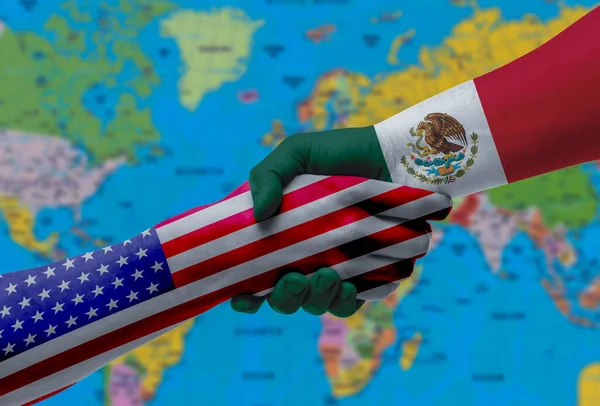 Mexico and USA - Flag handshake symbolizing partnership and cooperation with the United States of Americ