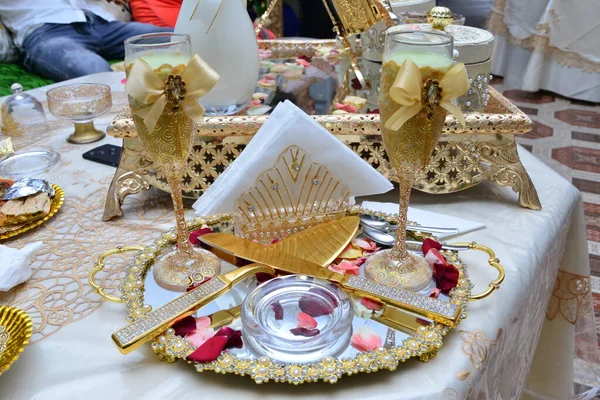 stock image Moroccan wedding table. Milk cups to be served to the bride and groom. Arab wedding traditions