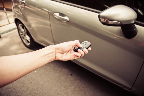 Handing hold the keys to a used car Royalty Free Stock Images