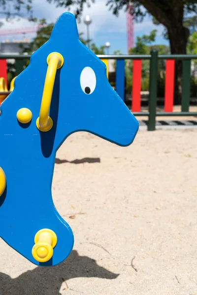 Close-up of blue horse at playground — Stock Photo, Image