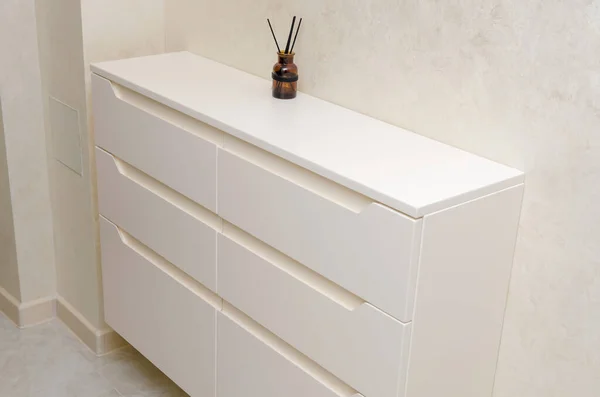 Shoe Cabinet in a modern stylish light hallway, copy space