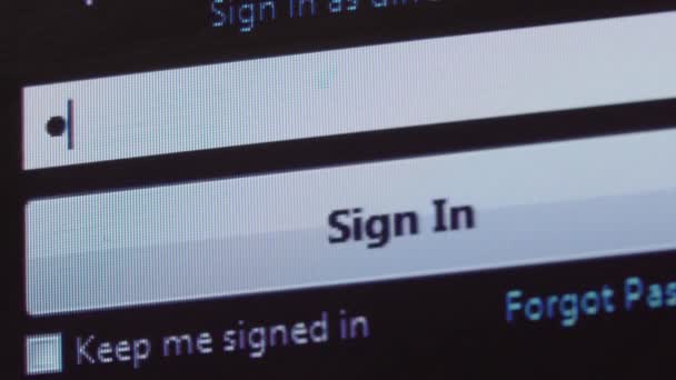 Password entry. Someone enters their password on the computer screen — Stock Video