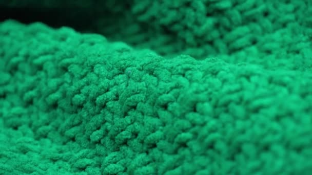 Super close-up. Details of green knitted wool fabric. textile background. macro — Stock Video