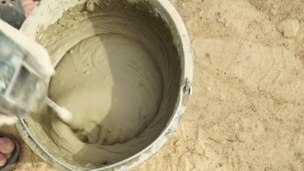 Rekaman pencampuran mortir beton — Stok Video