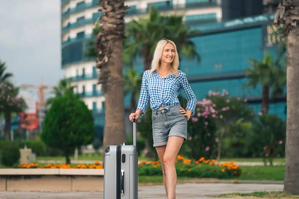 Young Happy Blonde Woman Shorts Shirt Gray Suitcase Standing Middle — Stock Photo, Image