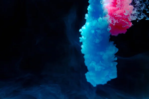Mehrfarbige Farben Wasser Tinte Wirbelt Unter Wasser Eine Wolke Der lizenzfreie Stockfotos