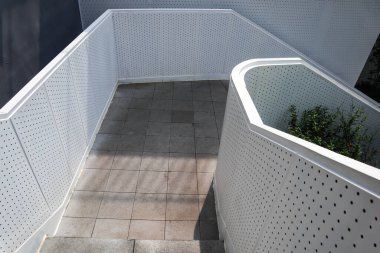 This is a staircase with a white baluster