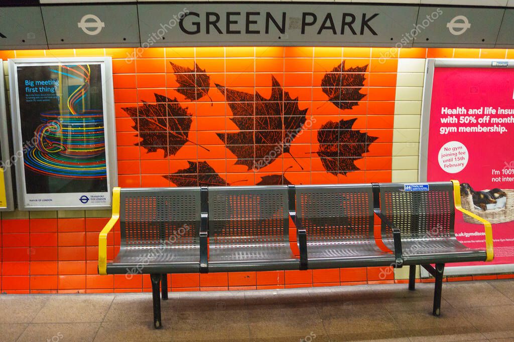 Underground Green park tube station in London. The London Underground is the oldest underground railway in the world covering 402 km of tracks.