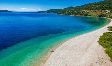Aerial top down view of the famous Agios Dimitrios (Saint Demetrios) Beach in Alonnisos island, Sporades, Greece, Europe clipart
