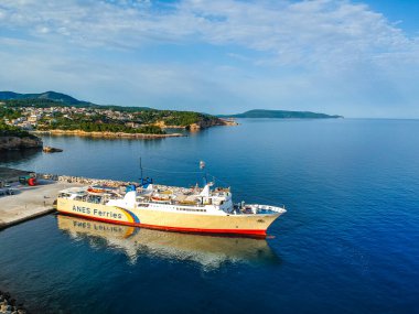 Proteus Ferry boat from Anes company docked in Alonissos port on the route to Skopelos Skiathos Volos in Sporades, Magnesia, Greece clipart