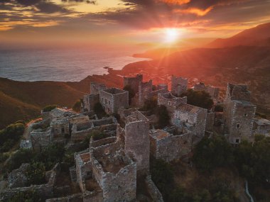 Aerial view of Vathia village against a Dramatic sunset sky. Vathia, Mani, Laconia, Peloponnese, Greece clipart