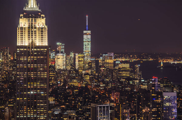 Aerial panoramic night view of New York city Buildings and Skyscrapers. Long exposure night view over New York, United States of America
