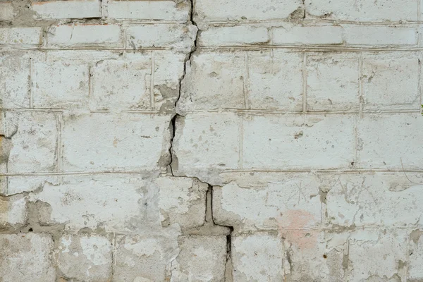 Textura de ladrillo con arañazos y grietas — Foto de Stock