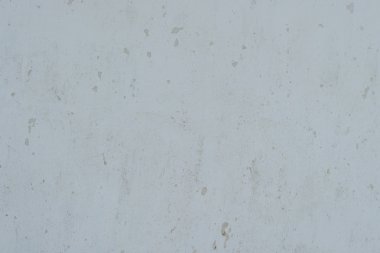 Çizik ve çatlaklarla dolu bir duvar parçası.