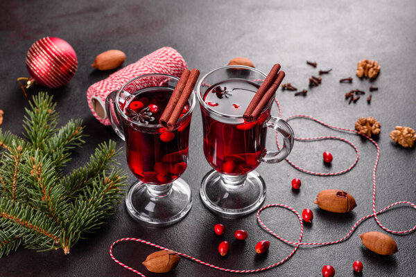 Hot mulled wine for winter and Christmas with various spices. Preparing for the Christmas holidays