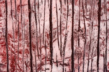 Doku, duvar, beton, arka plan olarak kullanılabilir. Çizik ve çatlaklarla dolu bir duvar parçası.