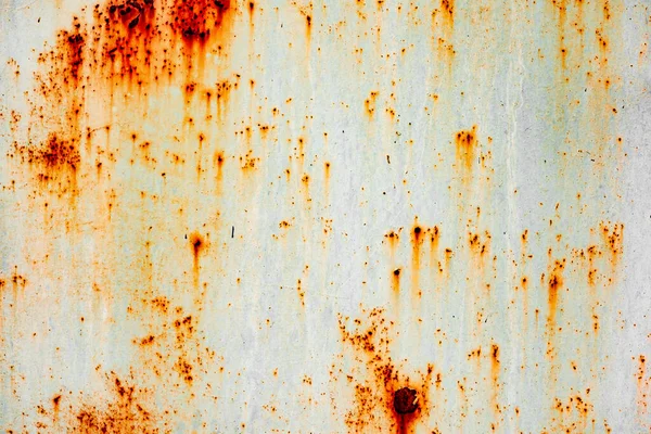 Texture of a metal wall with cracks and scratches which can be used as a background