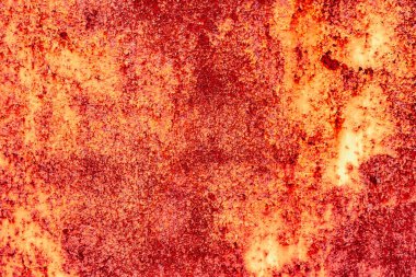 Çatlakları ve çizikleri olan metal bir duvarın dokusu arka plan olarak kullanılabilir.