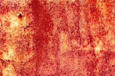 Çatlakları ve çizikleri olan metal bir duvarın dokusu arka plan olarak kullanılabilir.