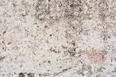 Doku, duvar, beton, arka plan olarak kullanılabilir. Çizik ve çatlaklarla dolu bir duvar parçası.