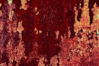 Çatlakları ve çizikleri olan metal bir duvarın dokusu arka plan olarak kullanılabilir.