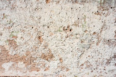 Doku, duvar, beton, arka plan olarak kullanılabilir. Çizik ve çatlaklarla dolu bir duvar parçası.