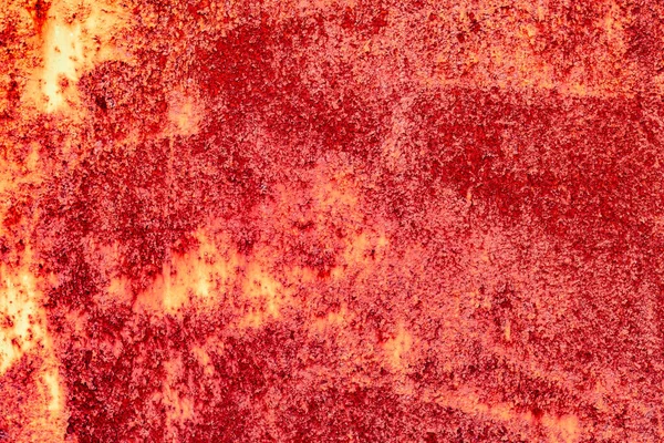 Çatlakları ve çizikleri olan metal bir duvarın dokusu arka plan olarak kullanılabilir.