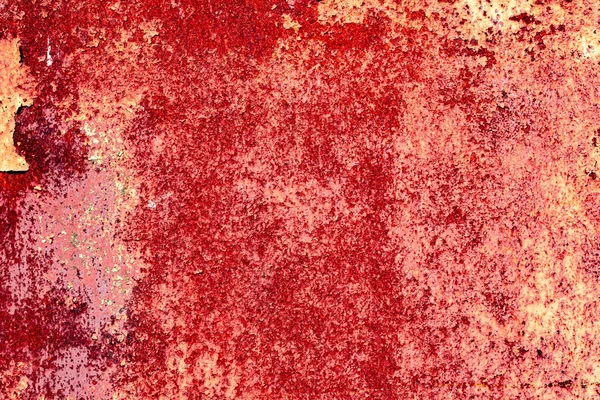 Çatlakları ve çizikleri olan metal bir duvarın dokusu arka plan olarak kullanılabilir.