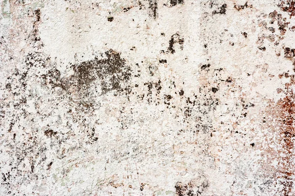 Doku, duvar, beton, arka plan olarak kullanılabilir. Çizik ve çatlaklarla dolu bir duvar parçası.