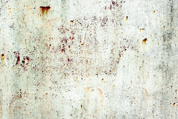 Texture of a metal wall with cracks and scratches which can be used as a background