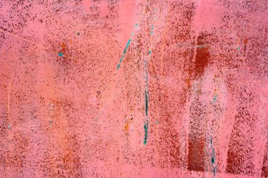 Çatlakları ve çizikleri olan metal bir duvarın dokusu arka plan olarak kullanılabilir.