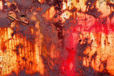 Çatlakları ve çizikleri olan metal bir duvarın dokusu arka plan olarak kullanılabilir.