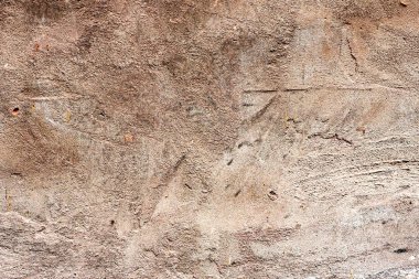 Doku, duvar, beton, arka plan olarak kullanılabilir. Çizik ve çatlaklarla dolu bir duvar parçası.