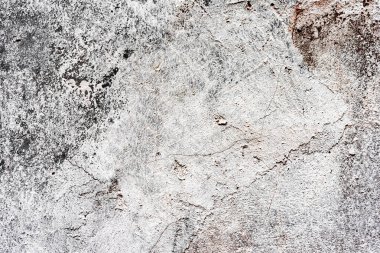 Doku, duvar, beton, arka plan olarak kullanılabilir. Çizik ve çatlaklarla dolu bir duvar parçası.