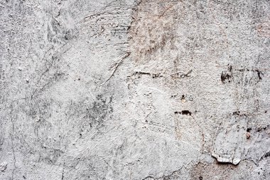 Doku, duvar, beton, arka plan olarak kullanılabilir. Çizik ve çatlaklarla dolu bir duvar parçası.