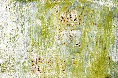 Çatlakları ve çizikleri olan metal bir duvarın dokusu arka plan olarak kullanılabilir.