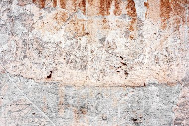 Doku, duvar, beton, arka plan olarak kullanılabilir. Çizik ve çatlaklarla dolu bir duvar parçası.