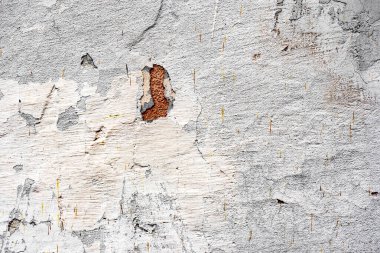 Doku, duvar, beton, arka plan olarak kullanılabilir. Çizik ve çatlaklarla dolu bir duvar parçası.