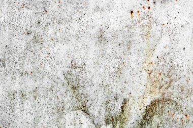 Çatlakları ve çizikleri olan metal bir duvarın dokusu arka plan olarak kullanılabilir.