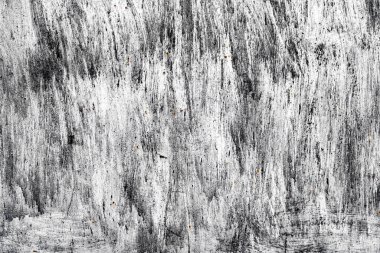 Çatlakları ve çizikleri olan metal bir duvarın dokusu arka plan olarak kullanılabilir.