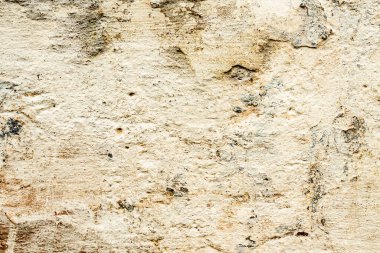 Doku, duvar, beton, arka plan olarak kullanılabilir. Çizik ve çatlaklarla dolu bir duvar parçası.