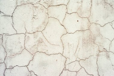 Doku, duvar, beton, arka plan olarak kullanılabilir. Çizik ve çatlaklarla dolu bir duvar parçası.