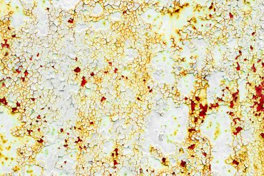 Çatlakları ve çizikleri olan metal bir duvarın dokusu arka plan olarak kullanılabilir.