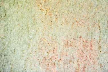 Doku, duvar, beton, arka plan olarak kullanılabilir. Çizik ve çatlaklarla dolu bir duvar parçası.