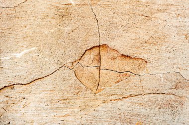 Doku, duvar, beton, arka plan olarak kullanılabilir. Çizik ve çatlaklarla dolu bir duvar parçası.