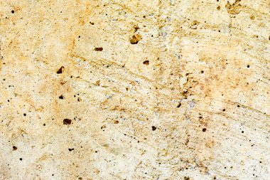 Doku, duvar, beton, arka plan olarak kullanılabilir. Çizik ve çatlaklarla dolu bir duvar parçası.